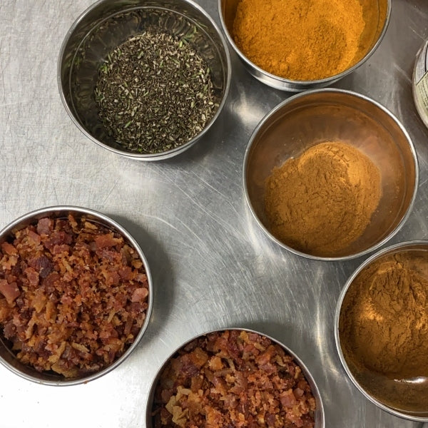 Fresh ingredients (spices, bacon) ready to go into the frypan